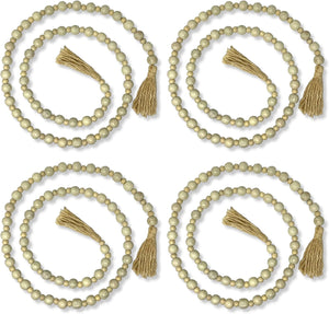 Set of four beige beaded garlands with tassels on a white background
