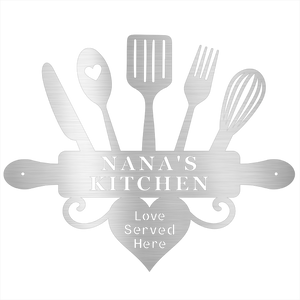 Decorative sign with kitchen utensils and 'Nana's Kitchen' text on a white background