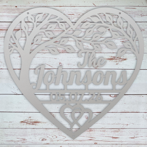 Personalized metal family name heart sign for outdoor wall display