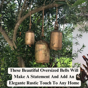 Oversized rustic Christmas bells hanging farmhouse holiday entryway decor