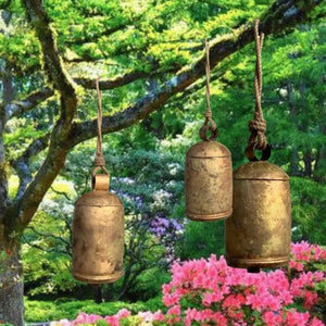 Large vintage style Christmas bells hanging with rope farmhouse holiday decoration