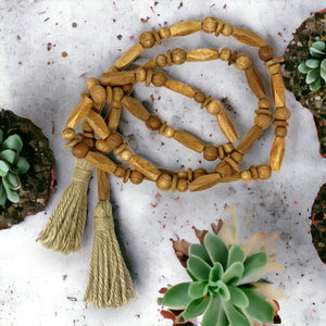 Natural wood bead garland for farmhouse mantel styling
