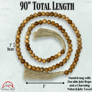 Wooden bead necklace with tassel on a white background, labeled with measurements and brand name.