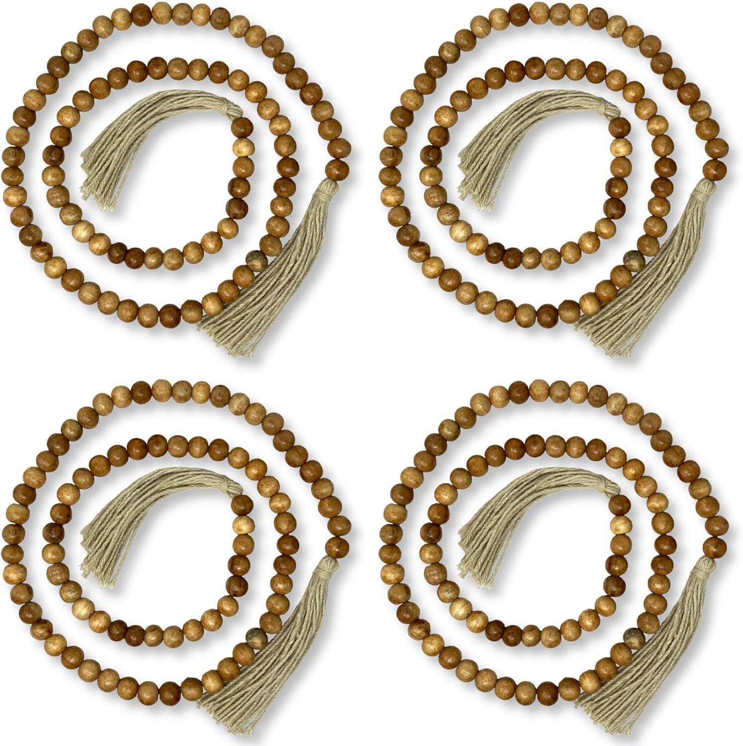 Four wooden beaded necklaces with tassels on a white background