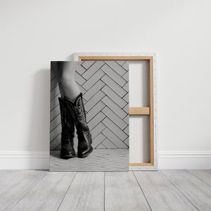 Black and white cowboy boots art in black framed canvas