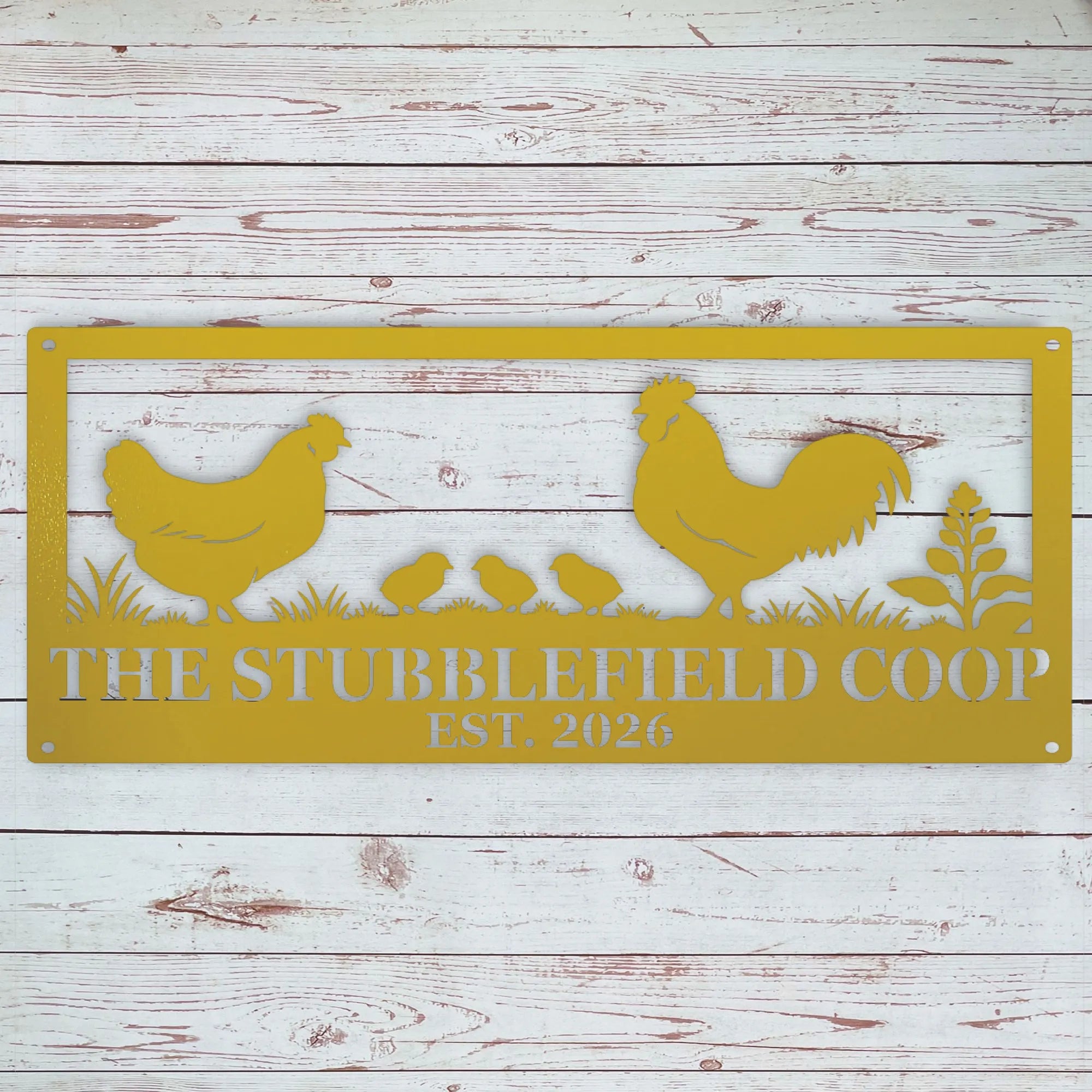 A rectangular yellow metal sign with a chicken, rooster, chicks, and plant silhouette design, featuring the text 'THE STUBBLEFIELD COOP' and 'EST. 2026' on a whitewashed wood plank background.