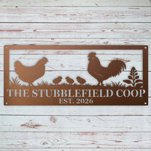 Close-up of precision-cut rooster, hen and chicks details on a powder-coated steel sign