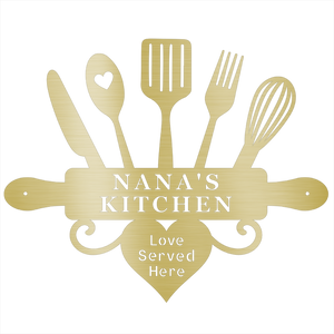 Decorative sign with kitchen utensils and 'Nana's Kitchen' text on a black background