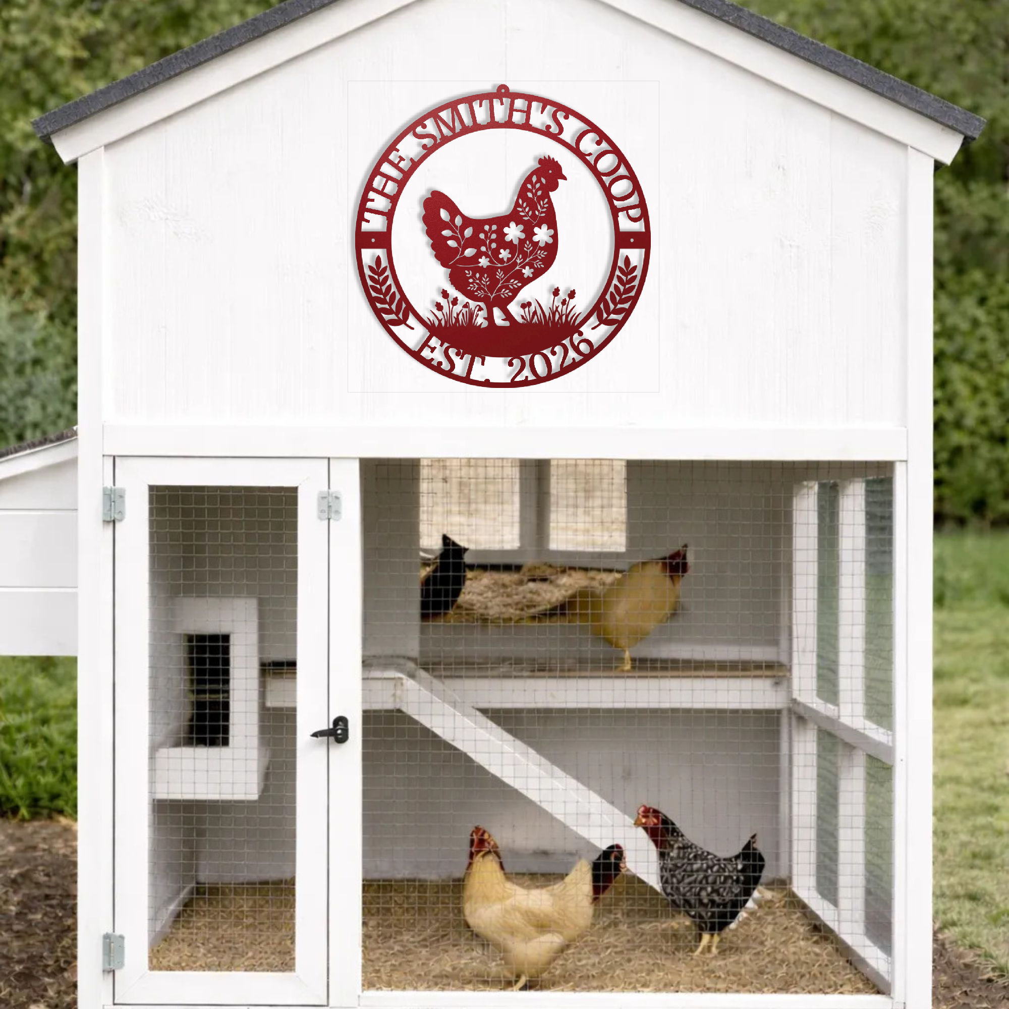 White chicken coop with a red chicken coop sign on the door, featuring three chickens inside.