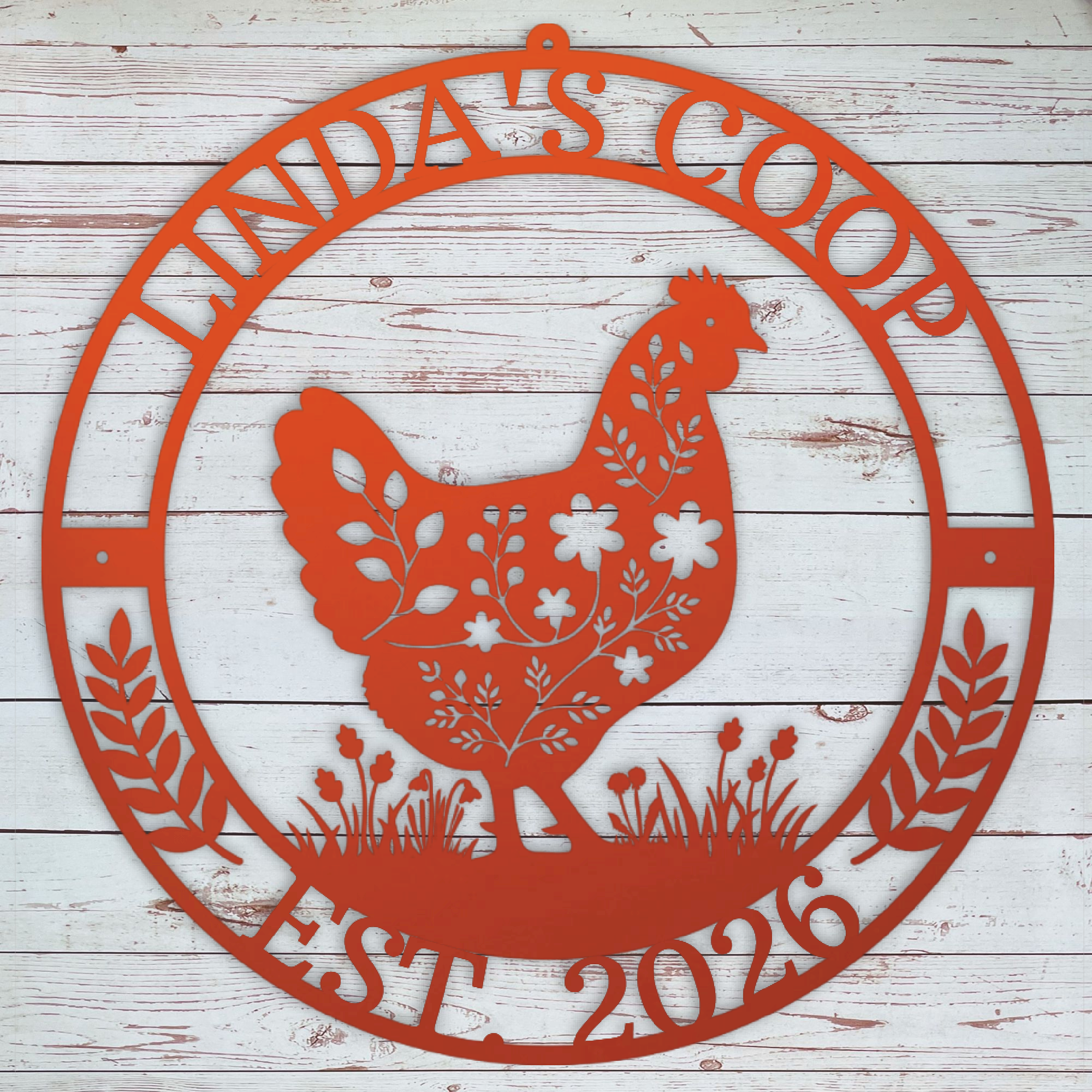 Decorative metal sign with a chicken silhouette and 'Winda's Coop' text on a wooden background
