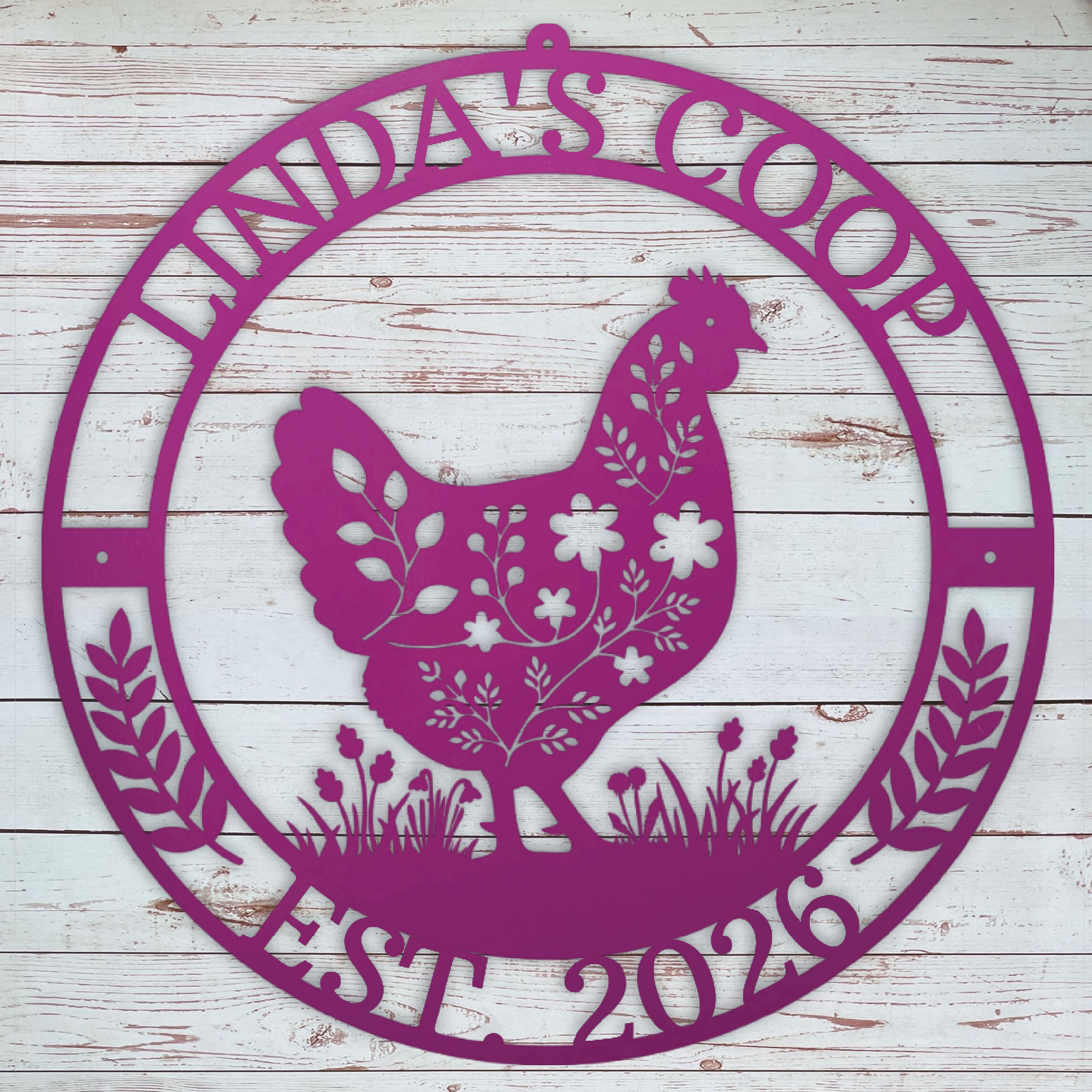 Decorative pink metal sign with a chicken design and 'Winda's Coop' text on a wooden background