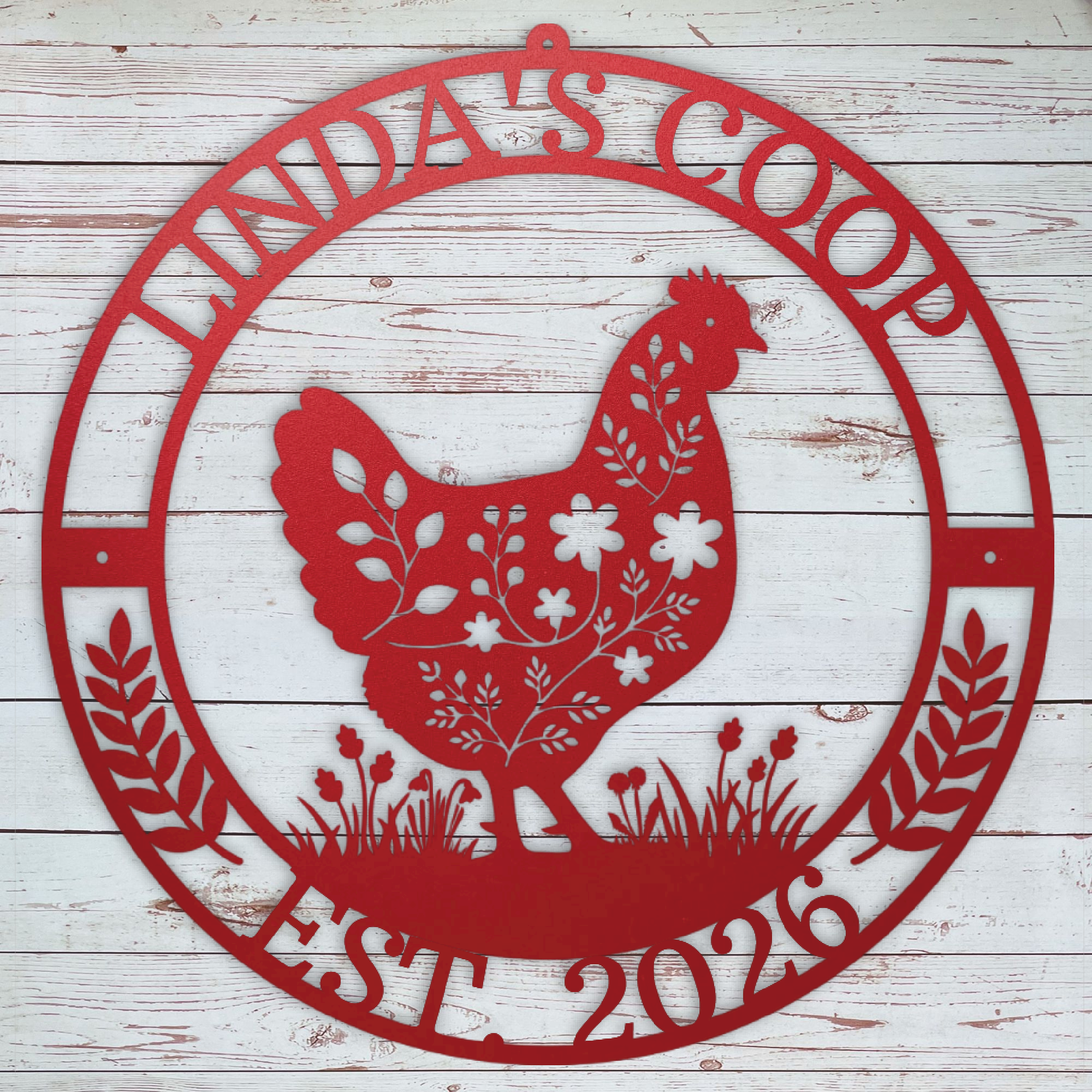 Red metal chicken coop sign with a chicken design and text on a wooden background
