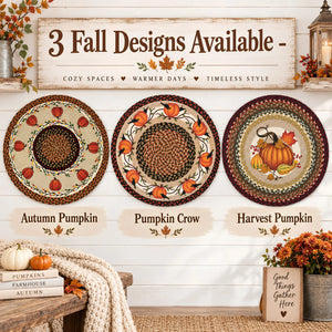 Three decorative woven wall hangings displayed on a white shiplap wall, with a sign above reading '3 Fall Designs Available' and labels below identifying 'Autumn Pumpkin,' 'Pumpkin Crow,' and 'Harvest Pumpkin.' The scene includes fall decor props such as pumpkins, flowers, a lantern, and a bench.