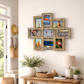 Farmhouse style multi-picture collage frame hanging on soft neutral wall above wooden entryway table with woven baskets, lamp, greenery, and natural decor accents.