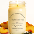 Southern Tea scented 16oz soy candle in a farmhouse style jar on a rustic wooden surface