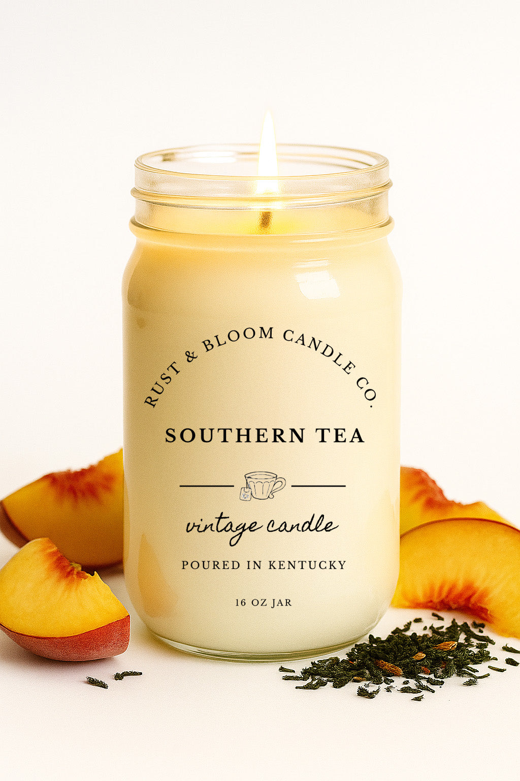 Southern Tea scented 16oz soy candle in a farmhouse style jar on a rustic wooden surface