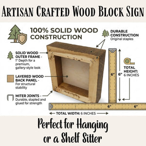 Wooden block sign with construction details and measurements on a beige background