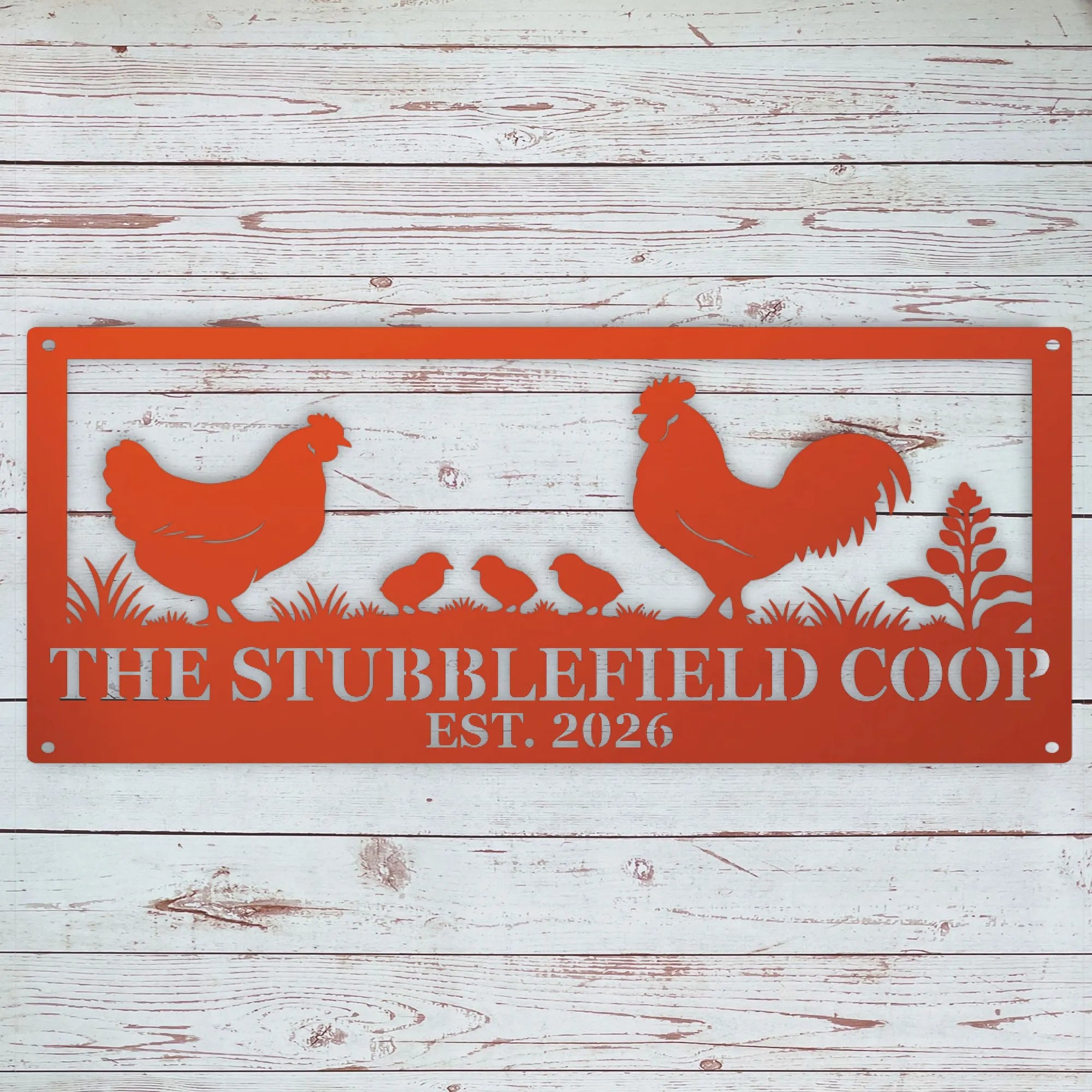 A rectangular red metal sign with cutout farm animal silhouettes and the text 'THE STUBBLEFIELD COOP EST. 2026' mounted against a whitewashed wood plank background.