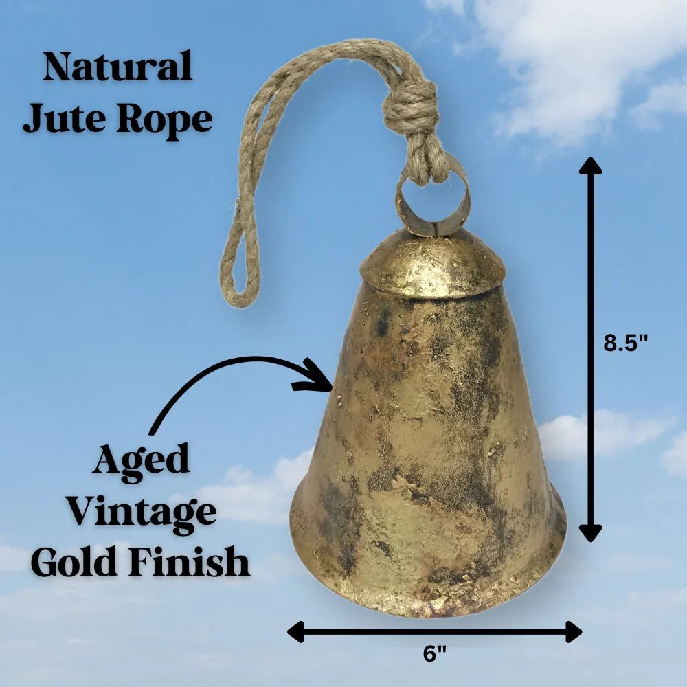 Antique gold farmhouse cow bell with wooden clapper